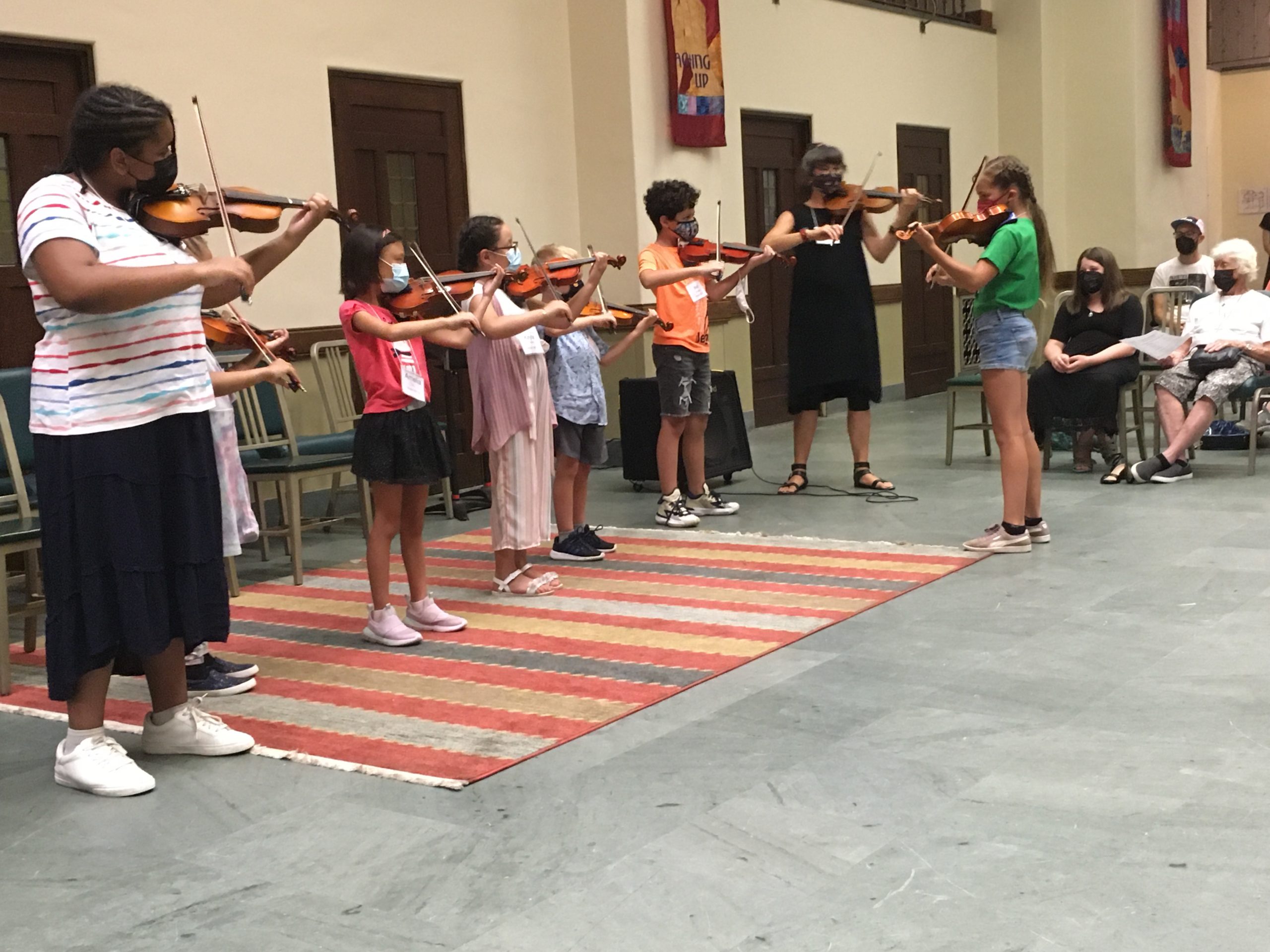 children playing violin